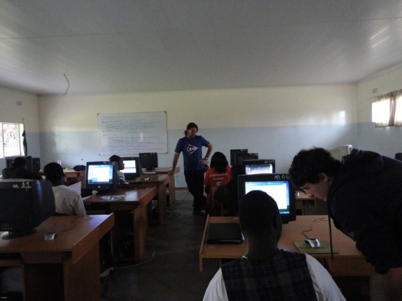Miguel and Jean Paul teach a computer class in the Skills Center.