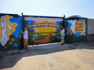 The new school gate painted by Emilia with help of Patricia. 